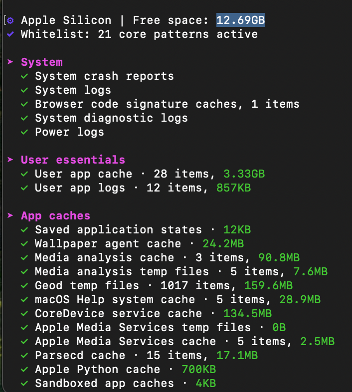 Mole's first scan on my MacBook, listing System, User essentials, and App caches categories with their sizes, and 12.69GB of free space at the top