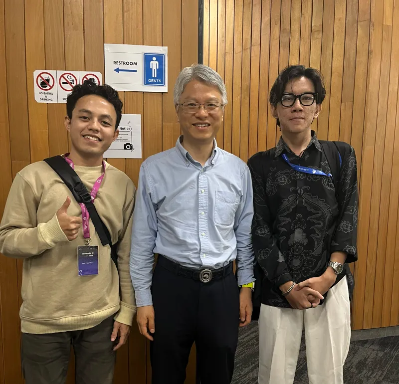 Rizki, Prof. Wen Yonggang of NTU, and Rizky at InnovateX 2026